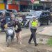 Gunakan HP Saat Berkendara Akan Ditilang