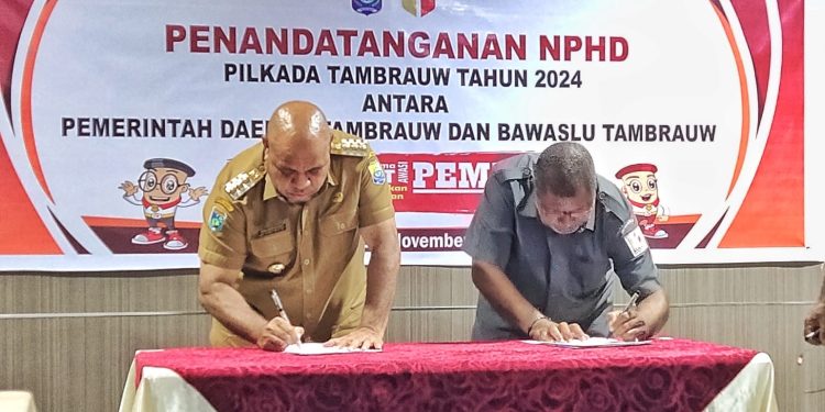 Sukseskan Pilkada 2024, Pemkab Tambrauw-Bawaslu Lakukan Penandatanganan NPHD Senilai Rp11 Miliar
